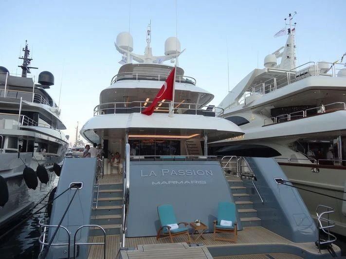 a large cruise ship docked aboard LA PASSION Yacht for Sale