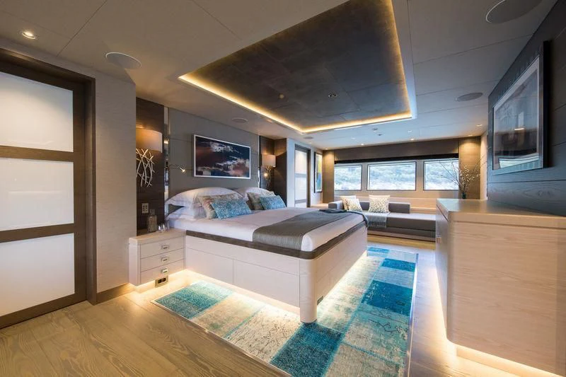 a bedroom with a large bed aboard LA PASSION Yacht for Sale