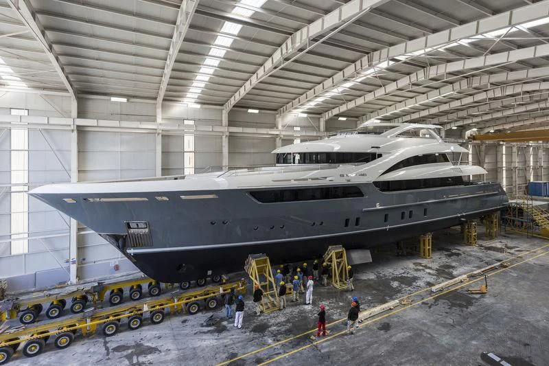 a large silver airplane in a hangar aboard LA PASSION Yacht for Sale