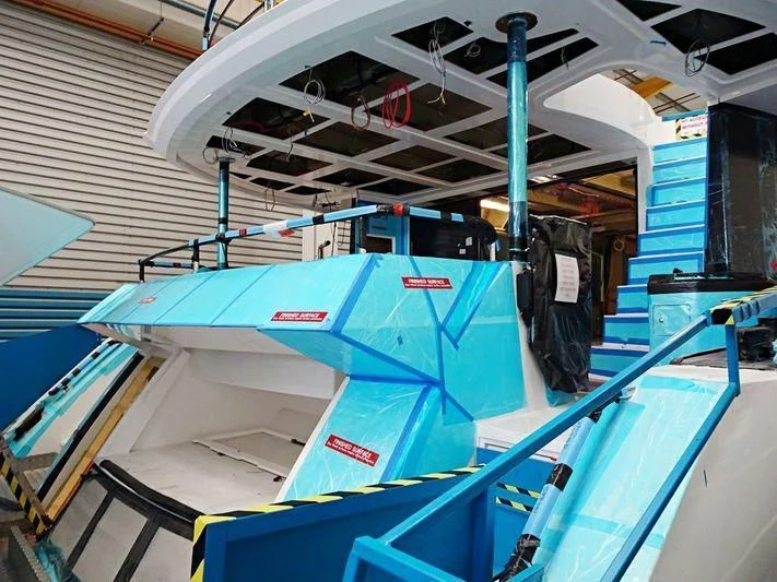a large blue machine aboard SANITY Yacht for Sale
