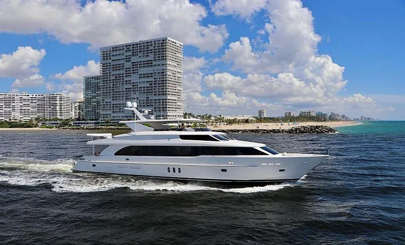 a white boat on the water aboard LOLA T Yacht for Sale