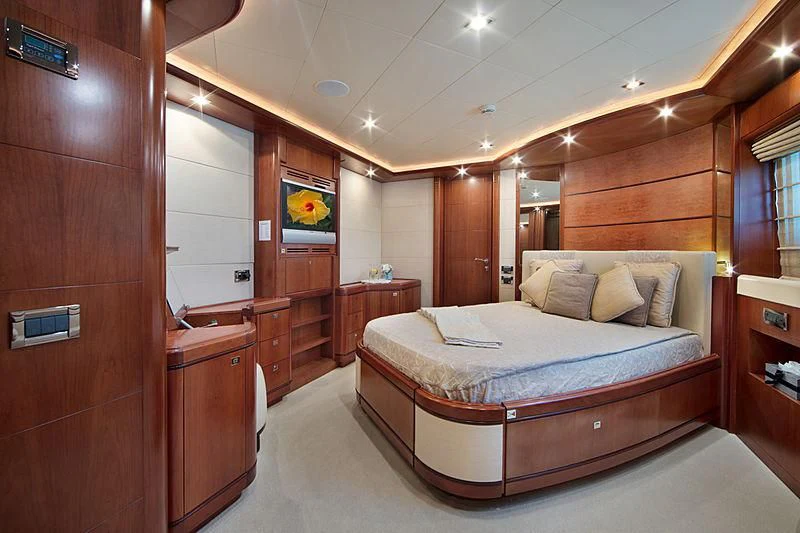 a bed in a room aboard SIMA Yacht for Sale