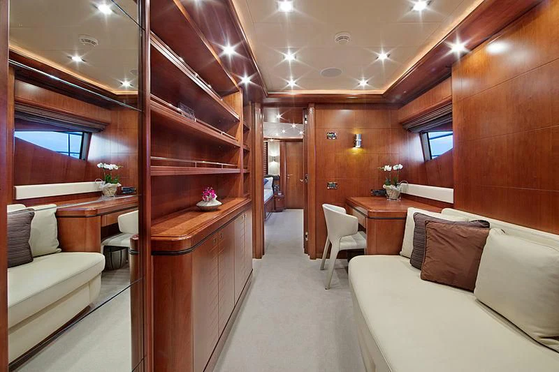 a room with a bed and a desk aboard SIMA Yacht for Sale