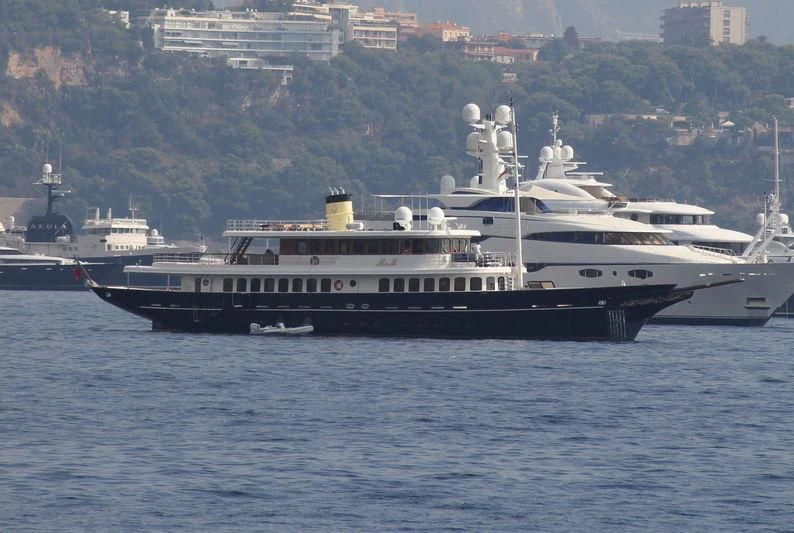 a large ship in the water aboard FLY ME TO THE MOON Yacht for Sale