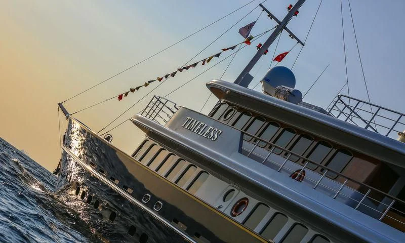 a large ship on the water aboard FLY ME TO THE MOON Yacht for Sale