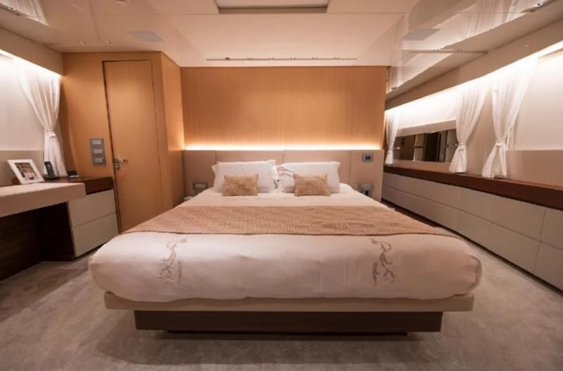 a bed in a room aboard RAYEN Yacht for Sale