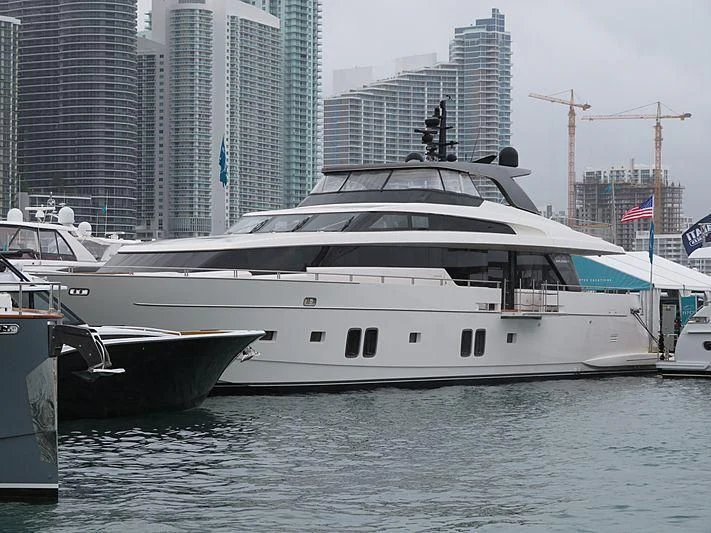 a couple of boats are parked in the water aboard RAYEN Yacht for Sale