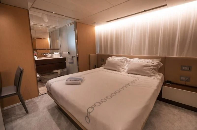 a bed in a room aboard RAYEN Yacht for Sale
