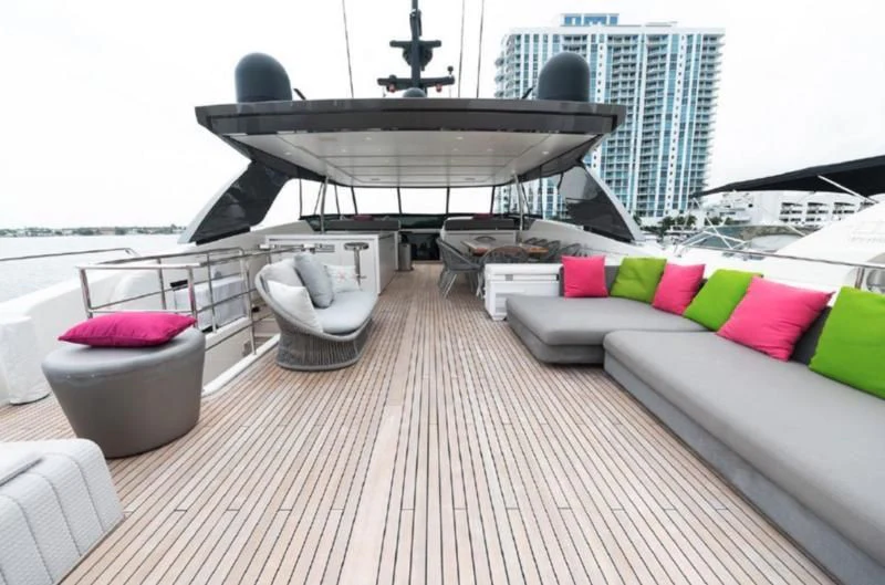 a large white boat on a deck aboard RAYEN Yacht for Sale