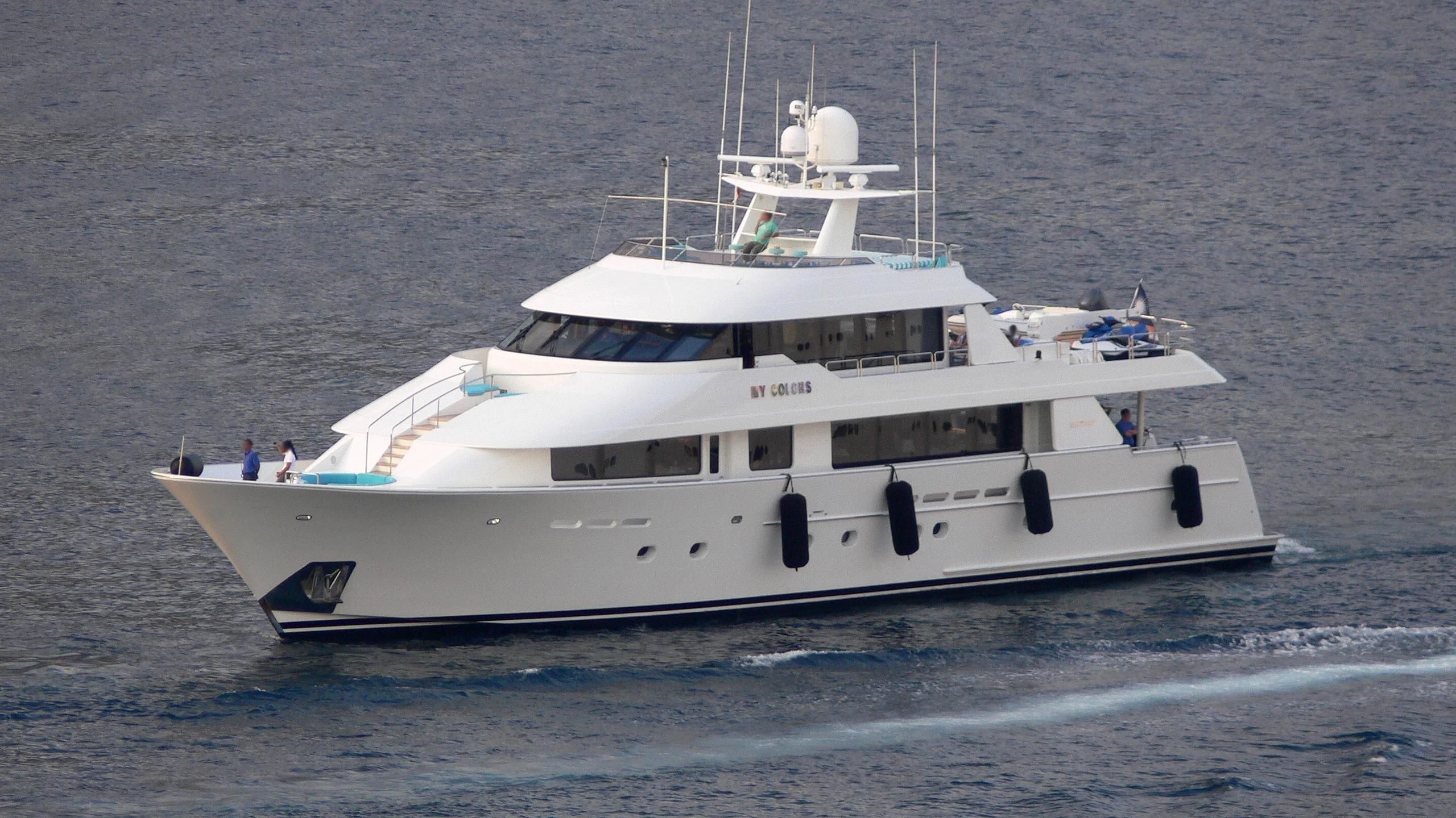 a white boat on the water aboard LIQUID REHAB Yacht for Sale