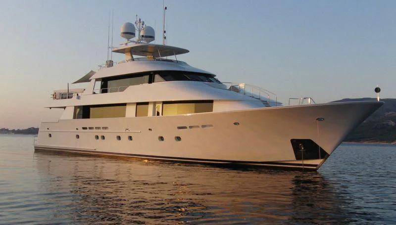 a large white boat on the water aboard LIQUID REHAB Yacht for Sale