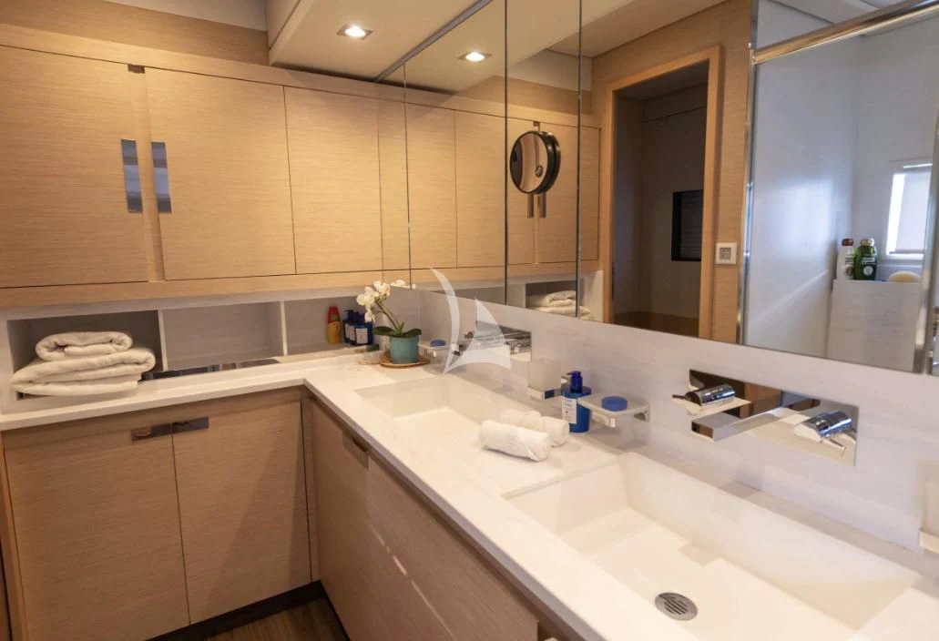 a bathroom with a large mirror aboard SERENISSIMA Yacht for Charter