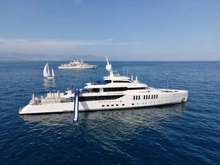 a large white boat in the water aboard SEASENSE Yacht for Sale