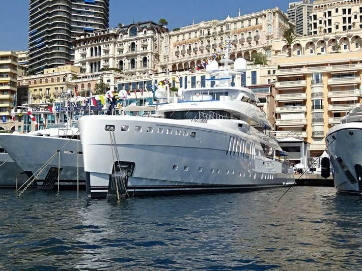 a white boat in the water aboard SEASENSE Yacht for Sale
