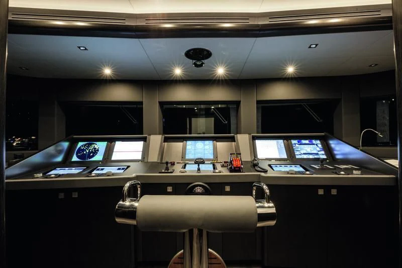 a room with a desk and computers aboard SEASENSE Yacht for Sale