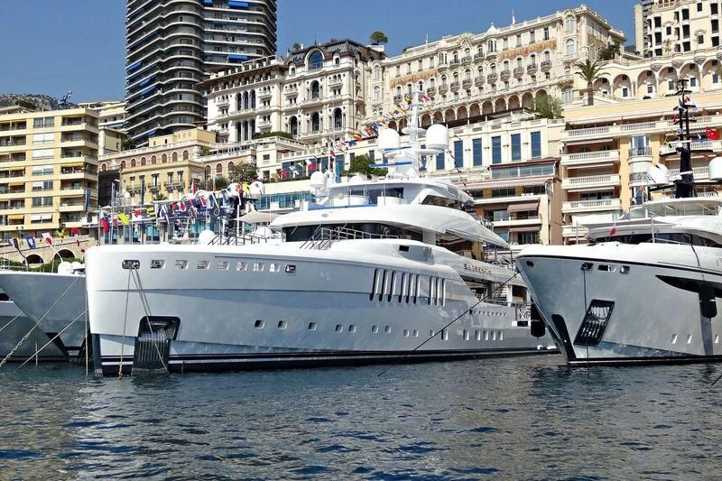 a couple of boats in a harbor aboard SEASENSE Yacht for Sale