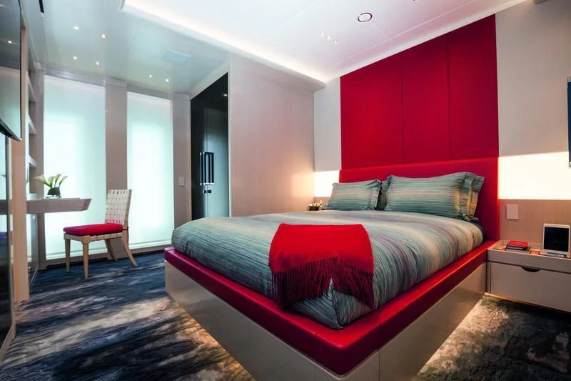 a bed in a room aboard SEASENSE Yacht for Sale