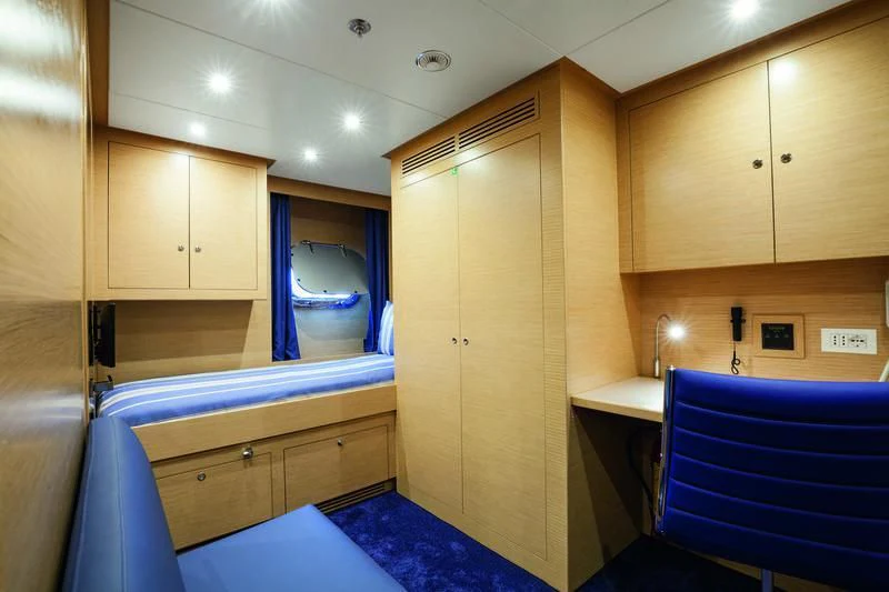 a kitchen with a large wooden door aboard SEASENSE Yacht for Sale