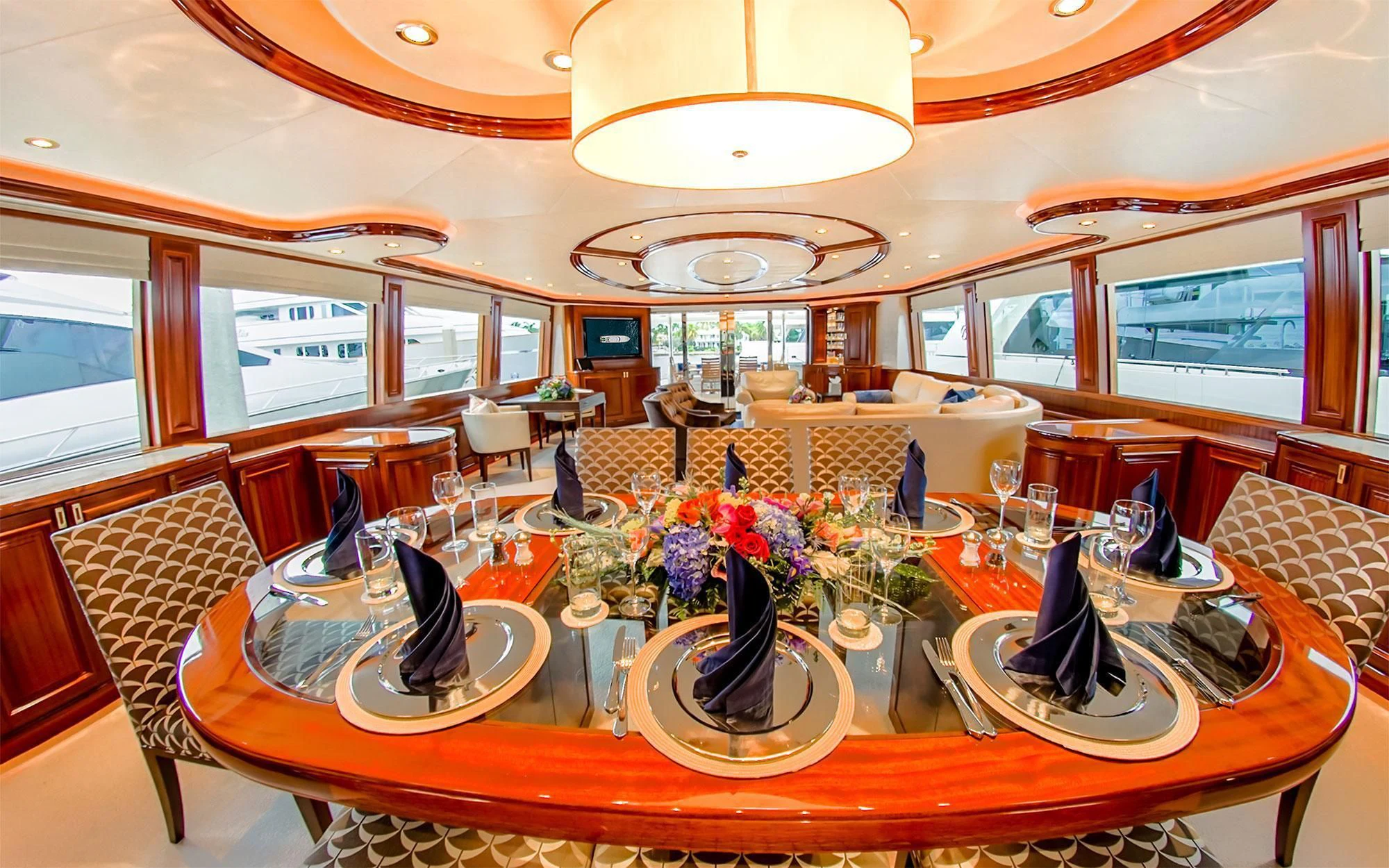 a dining room with a table set aboard SEASENSE Yacht for Sale