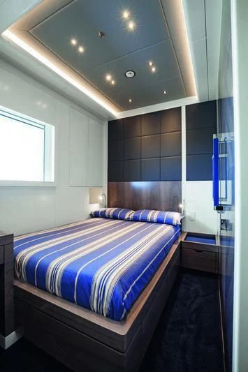 a bed in a room aboard SEASENSE Yacht for Sale