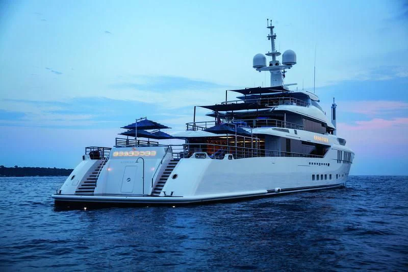 a large white boat on the water aboard SEASENSE Yacht for Sale