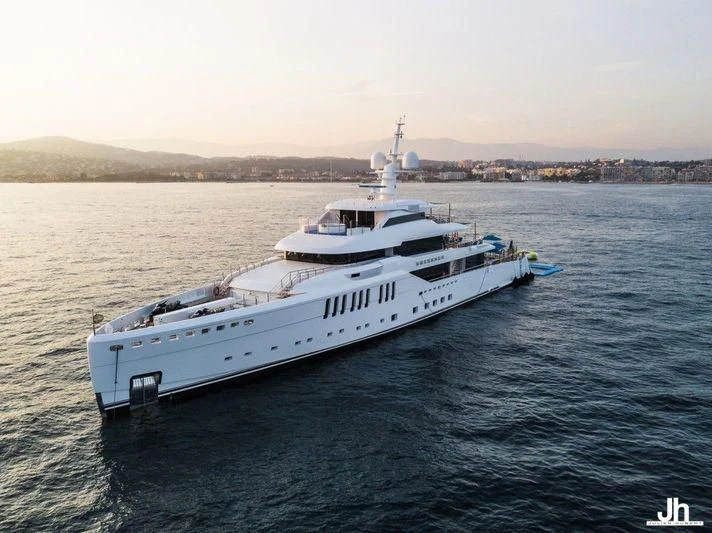 a large white ship in the water aboard SEASENSE Yacht for Sale