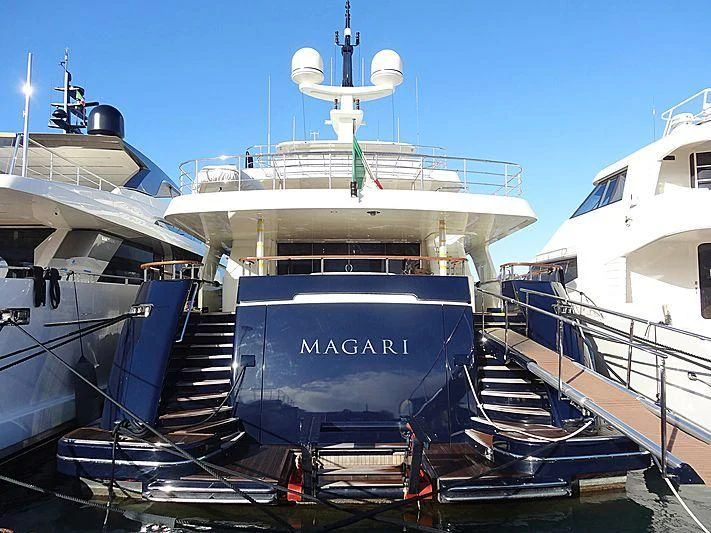a boat docked at a port aboard MAGARI Yacht for Sale