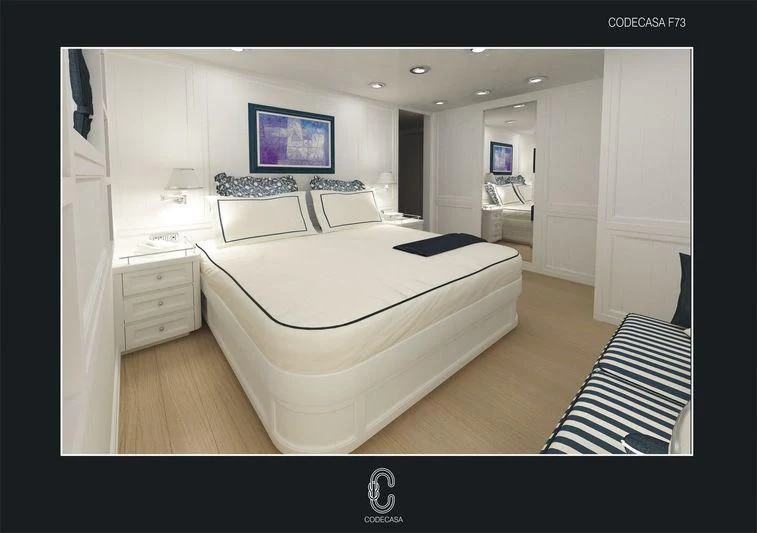 a large bedroom with a large bed aboard MAGARI Yacht for Sale