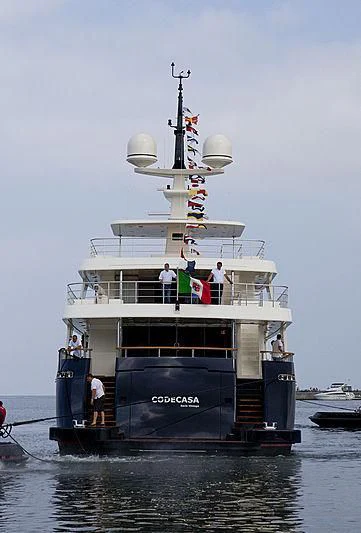 a large boat with a group of people on it aboard MAGARI Yacht for Sale