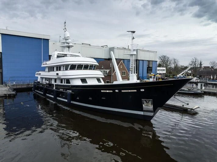 a boat docked at a pier aboard MOONSHADOW Yacht for Sale