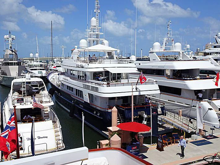 a large boat docked at a port aboard MOONSHADOW Yacht for Sale