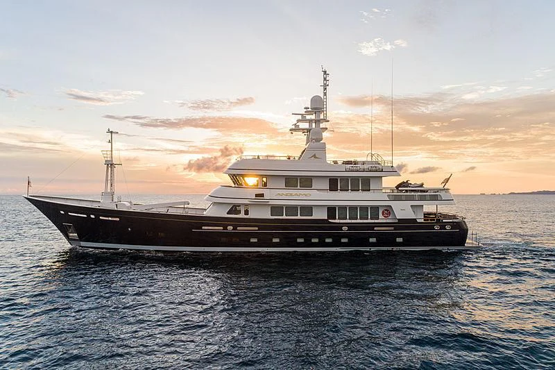 a large boat in the water aboard MOONSHADOW Yacht for Sale
