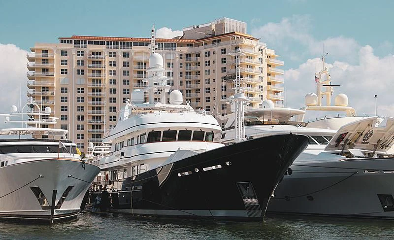 a few large boats in the water aboard MOONSHADOW Yacht for Sale
