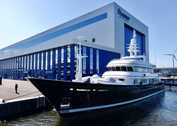 a large white boat aboard MOONSHADOW Yacht for Sale