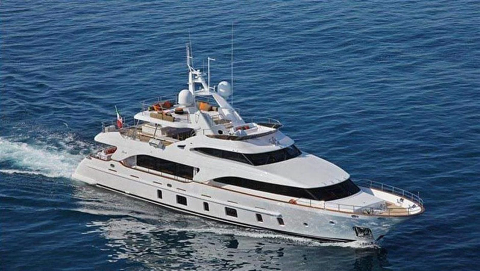 a white yacht in the water aboard BENNETTI 105 Yacht for Sale