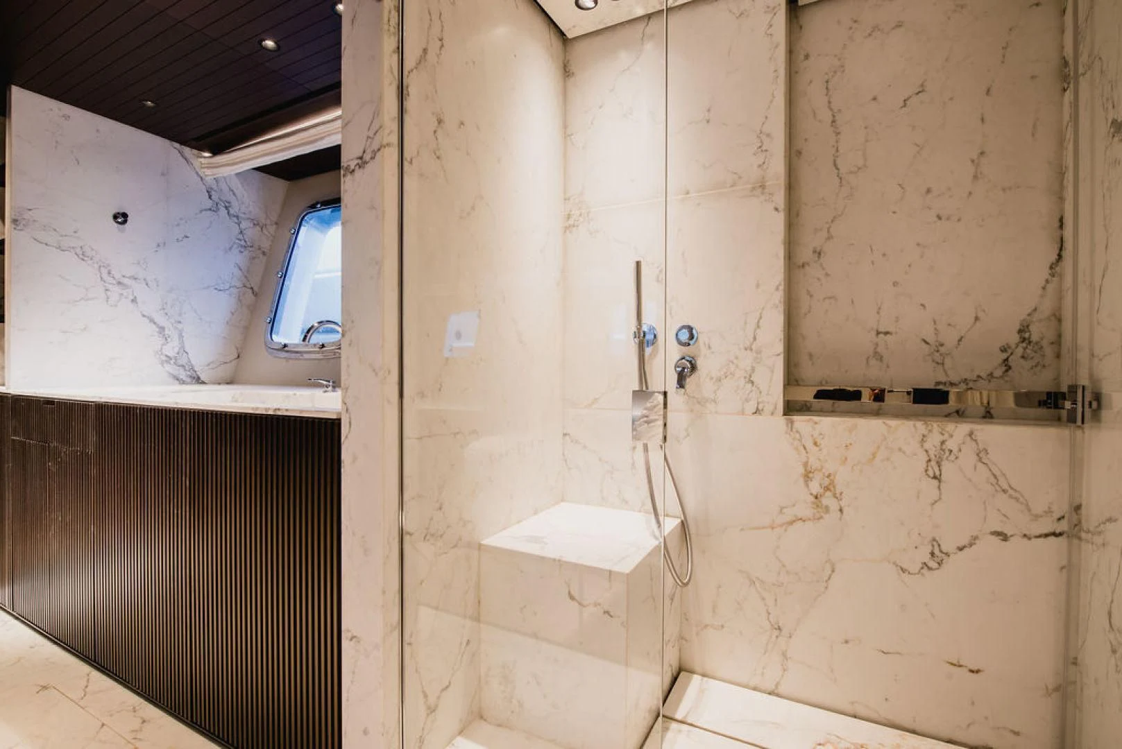 a wall with a window and a door aboard ZAZZAZU II Yacht for Sale