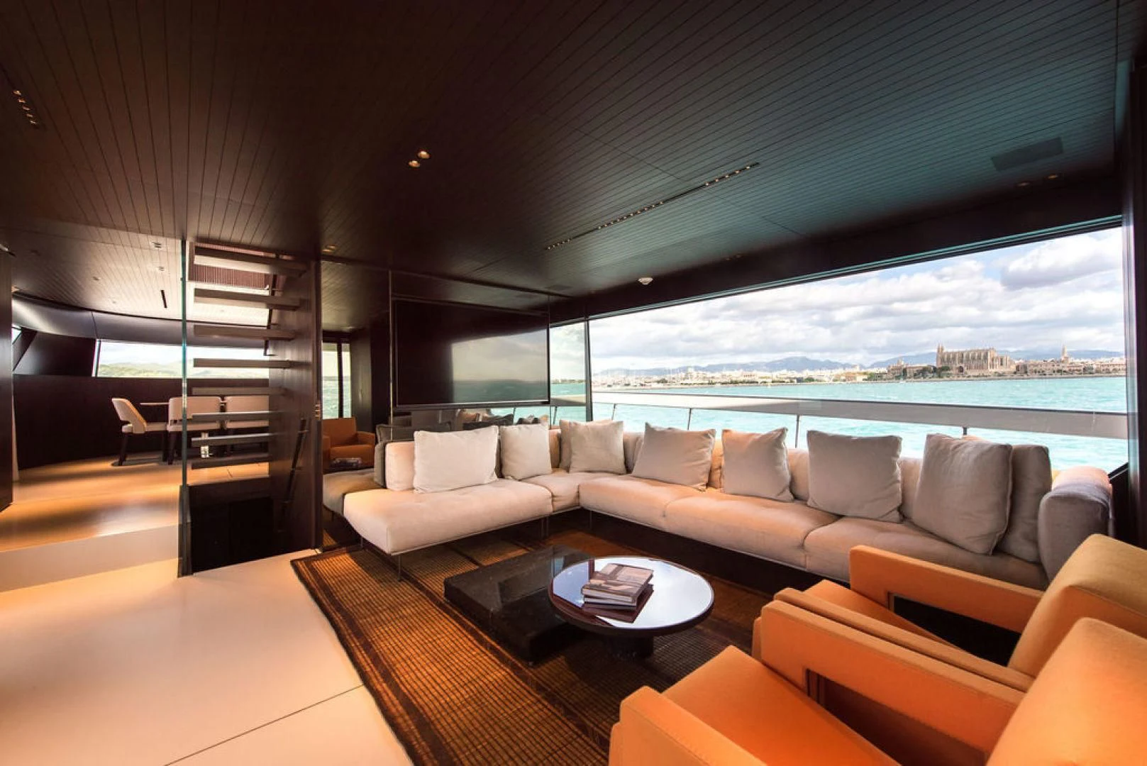 a living room with a large window aboard ZAZZAZU II Yacht for Sale