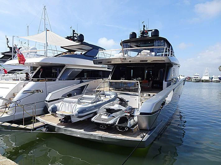 a boat docked at a pier aboard ZAZZAZU II Yacht for Sale