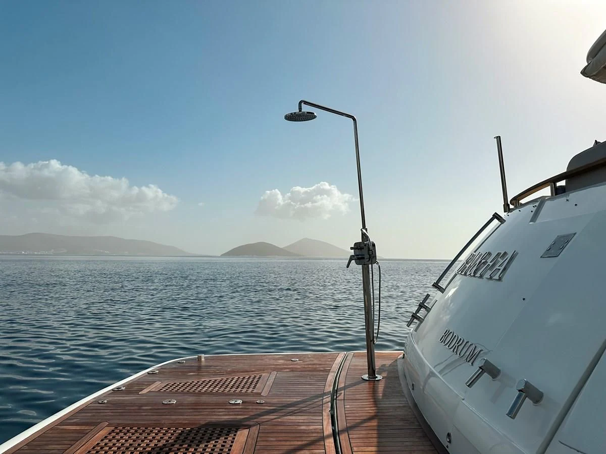 a boat on the water aboard FAIRLINE SQUADRON 74 Yacht for Sale
