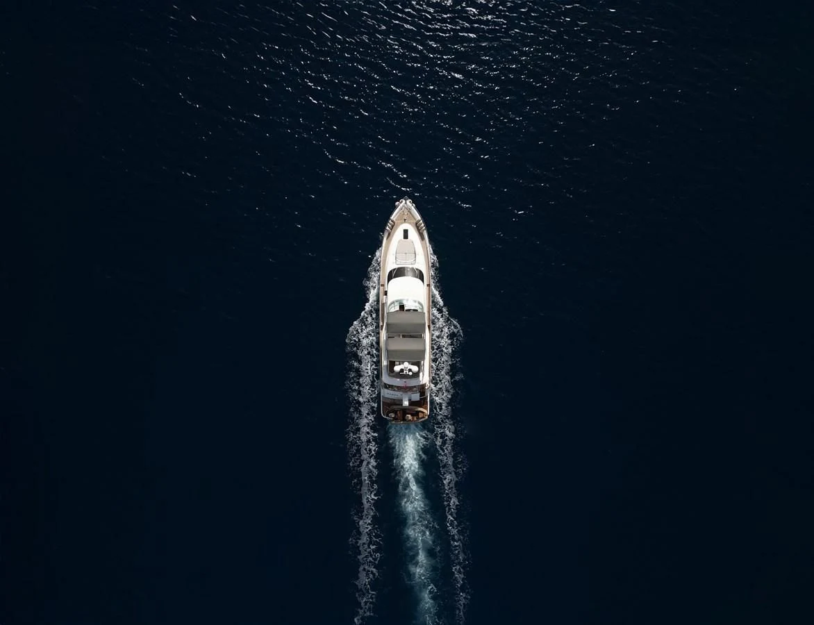 a rocket with smoke coming out of it with Chrysler Building in the background aboard FAIRLINE SQUADRON 74 Yacht for Sale