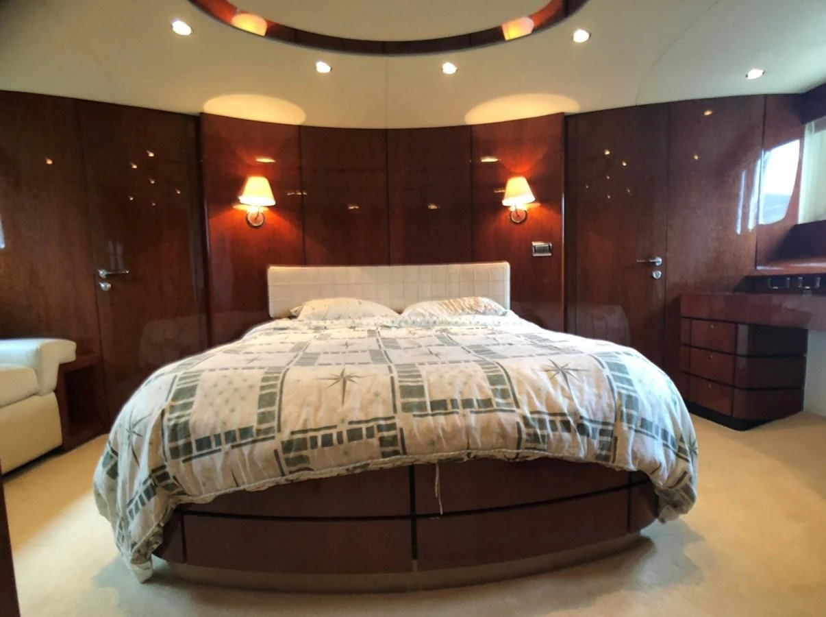 a bed in a room aboard FAIRLINE SQUADRON 74 Yacht for Sale