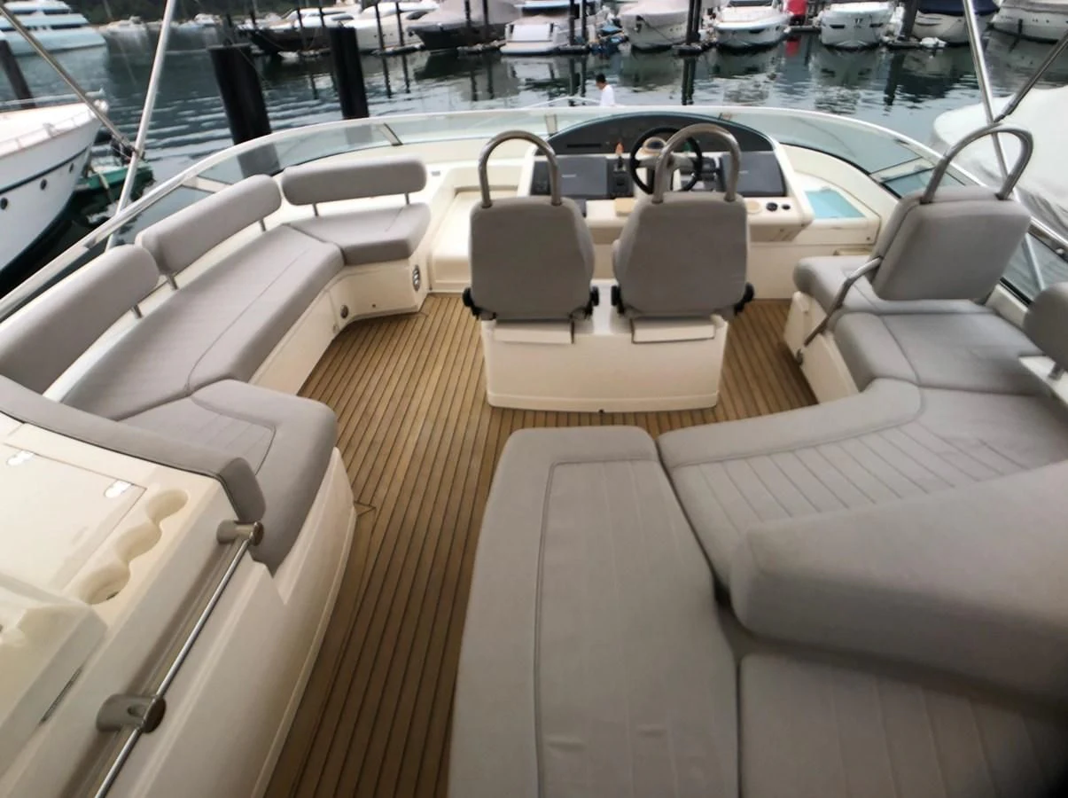 a boat with seats aboard FAIRLINE SQUADRON 74 Yacht for Sale