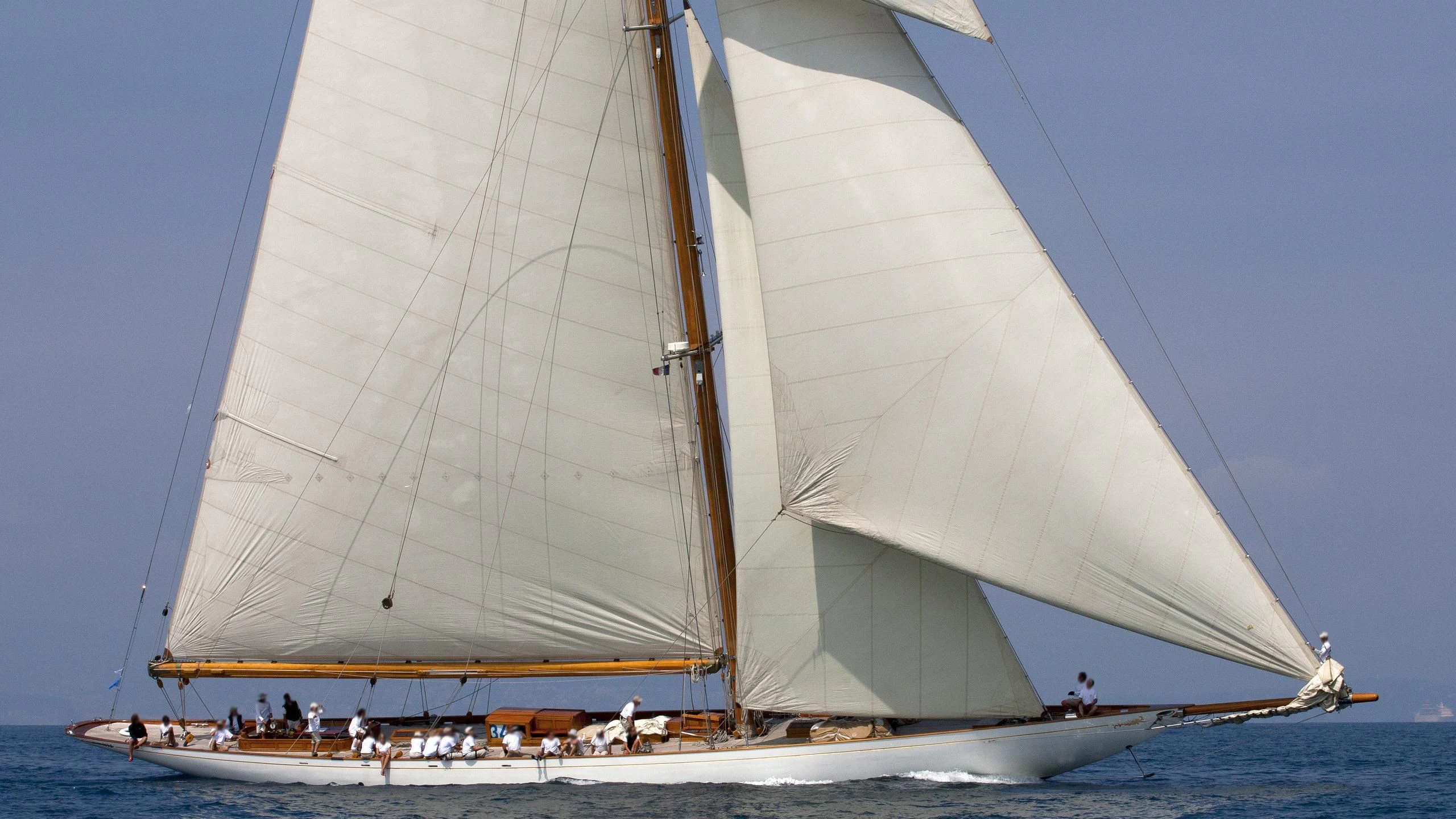 a sailboat with people on it aboard CAMBRIA Yacht for Sale