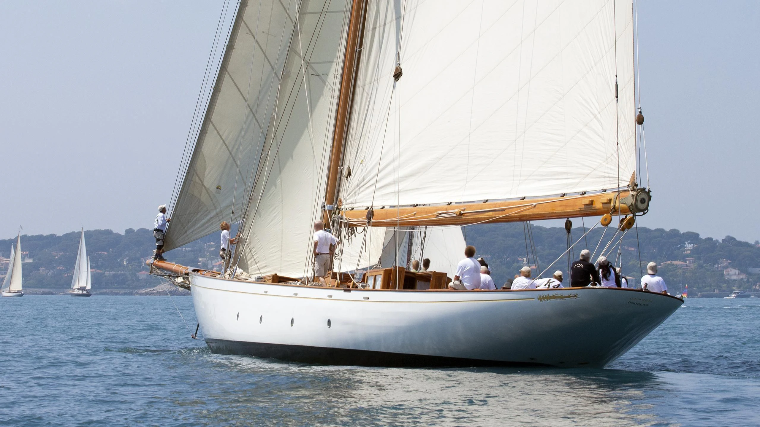 a sailboat with people on it aboard CAMBRIA Yacht for Sale