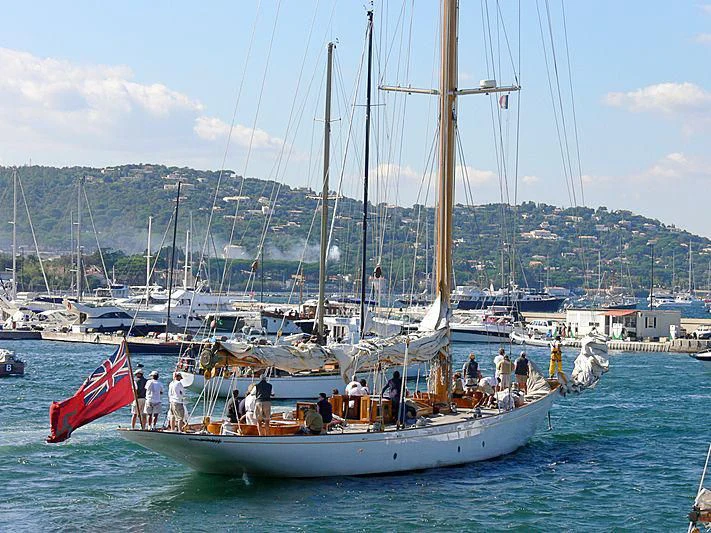 a group of people sailing on a boat aboard CAMBRIA Yacht for Sale