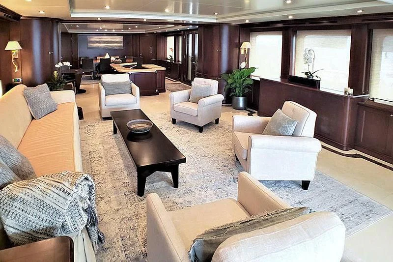 a room with a couch and a table and chairs aboard CRISTOBAL Yacht for Charter