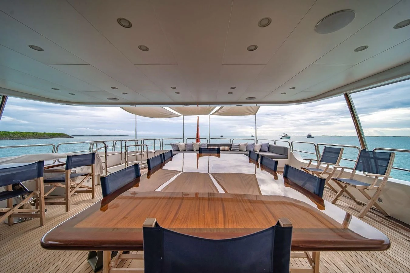 a boat with tables and chairs aboard CRISTOBAL Yacht for Charter
