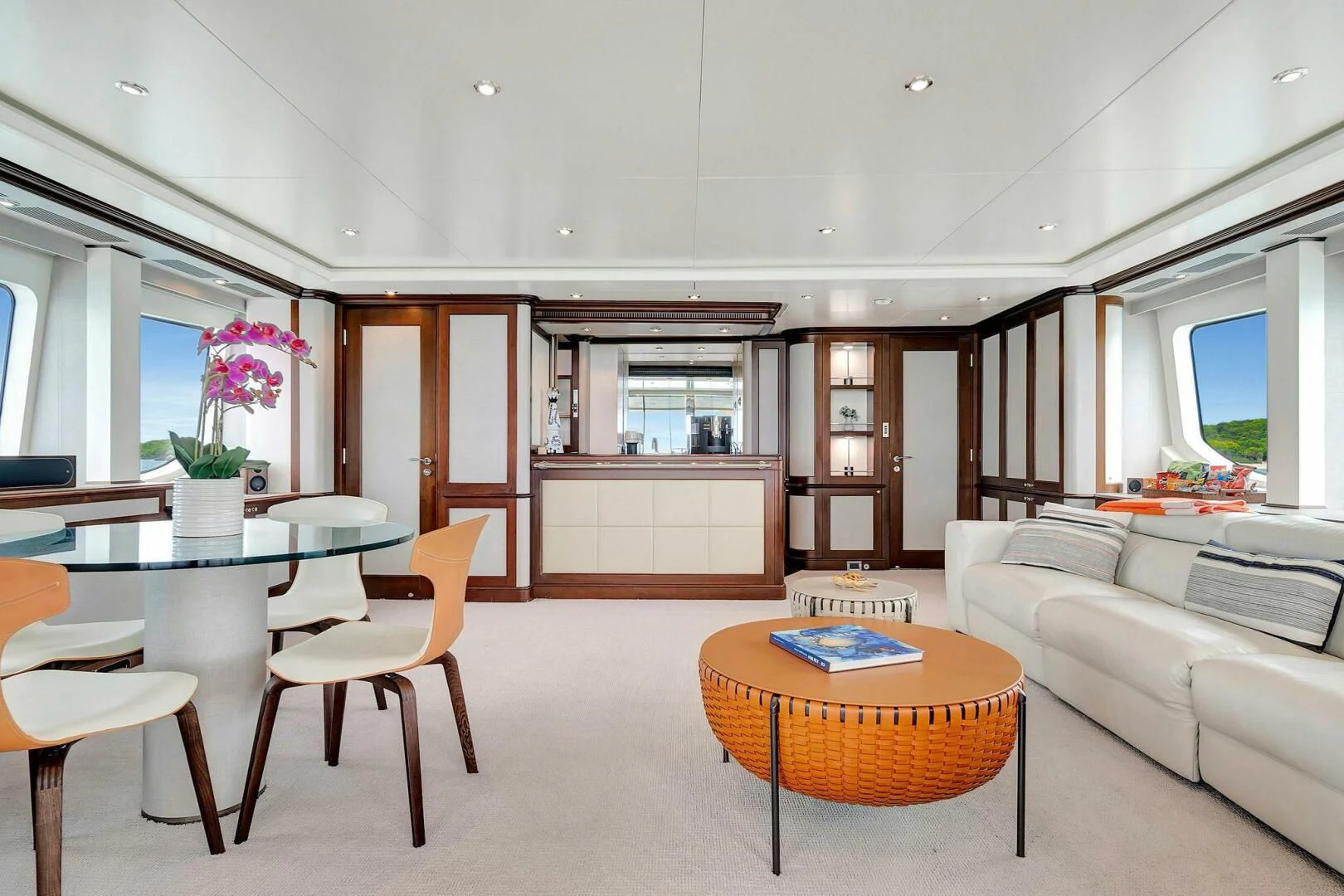 a living room with a couch and a table aboard CRISTOBAL Yacht for Charter