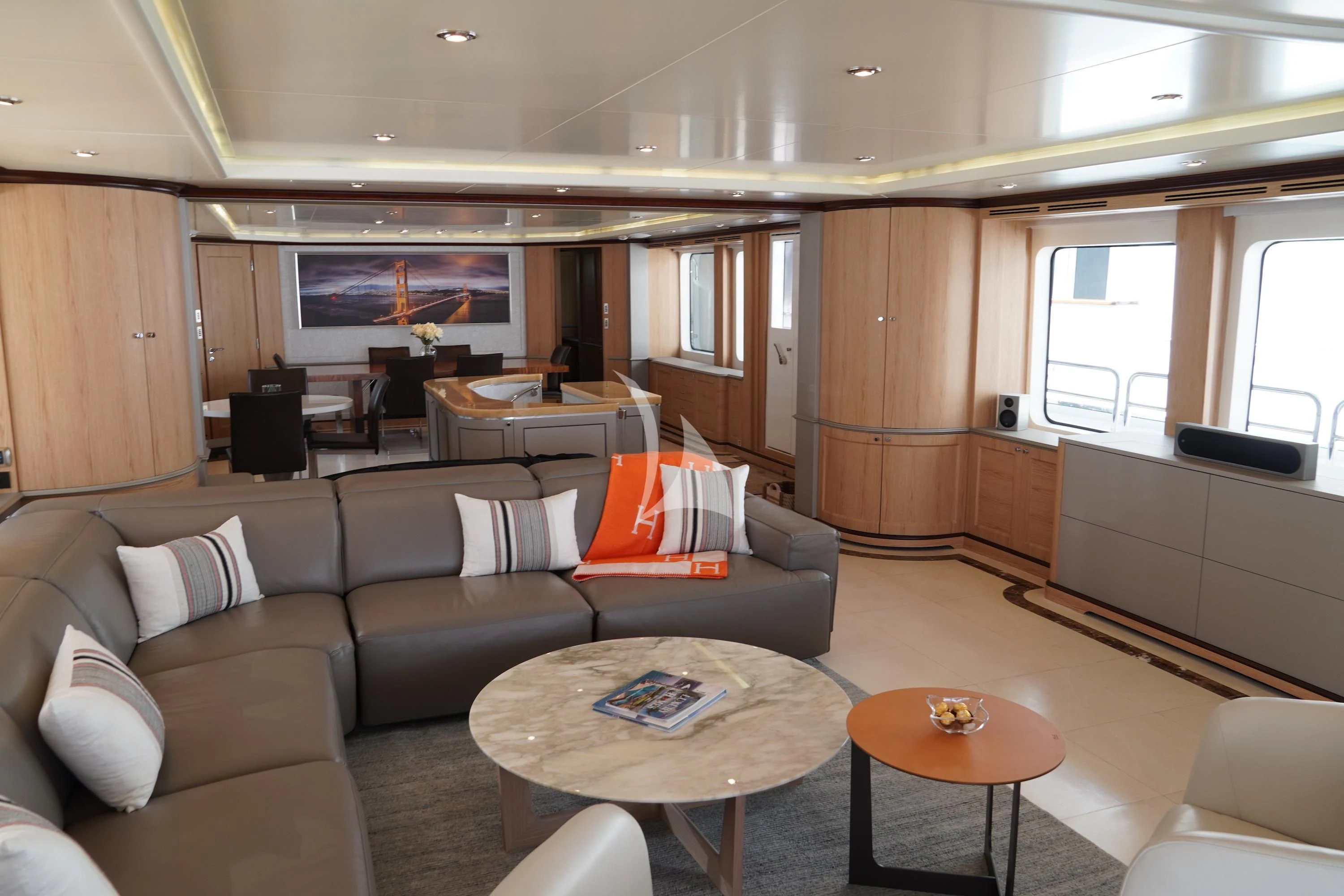 a living room with a couch and a coffee table aboard CRISTOBAL Yacht for Charter