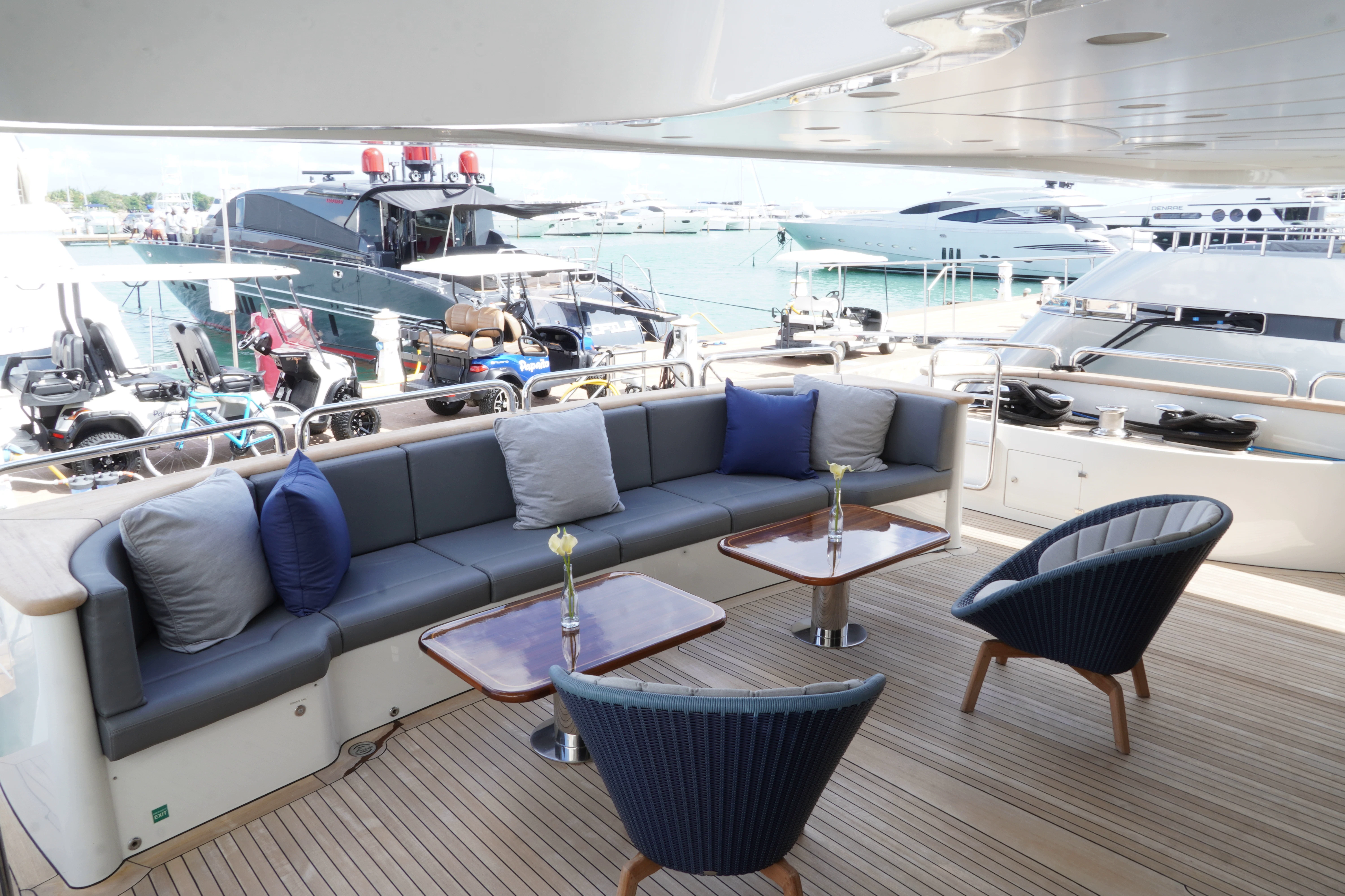 a boat with a couch and chairs aboard CRISTOBAL Yacht for Charter